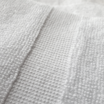 Close up of plain linen towel (product image)