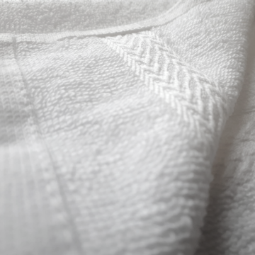 Close up of white dobby towel (Product Image)