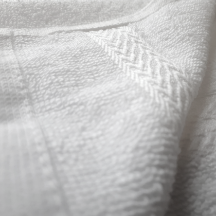 Close up of white dobby towel (Product Image)
